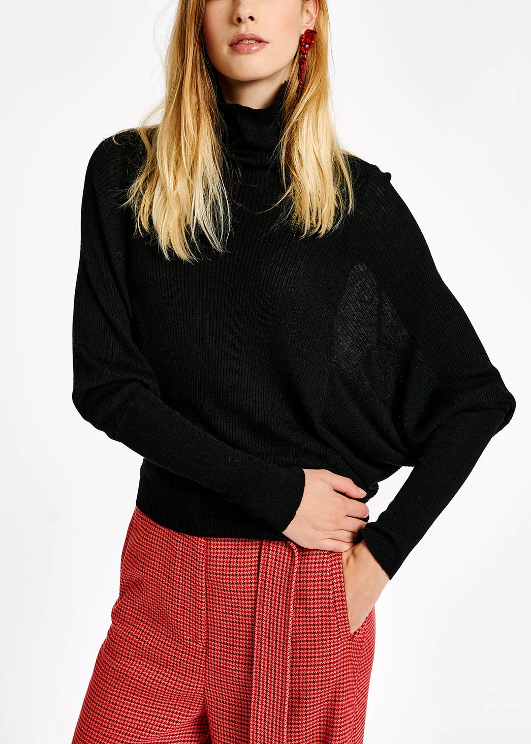 Black batwing-sleeve turtleneck sweater